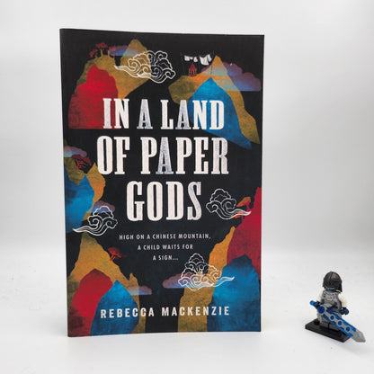 In a Land of Paper Gods - Rebecca Mackenzie